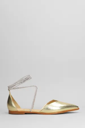 Ballet flats in gold leather