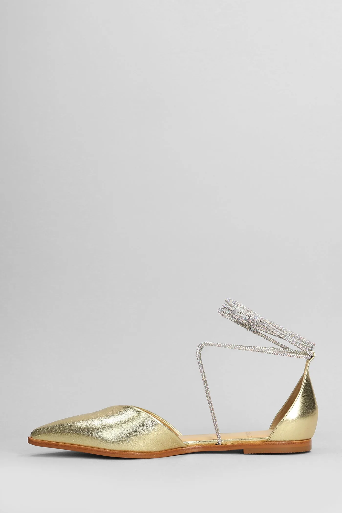 Ballet flats in gold leather