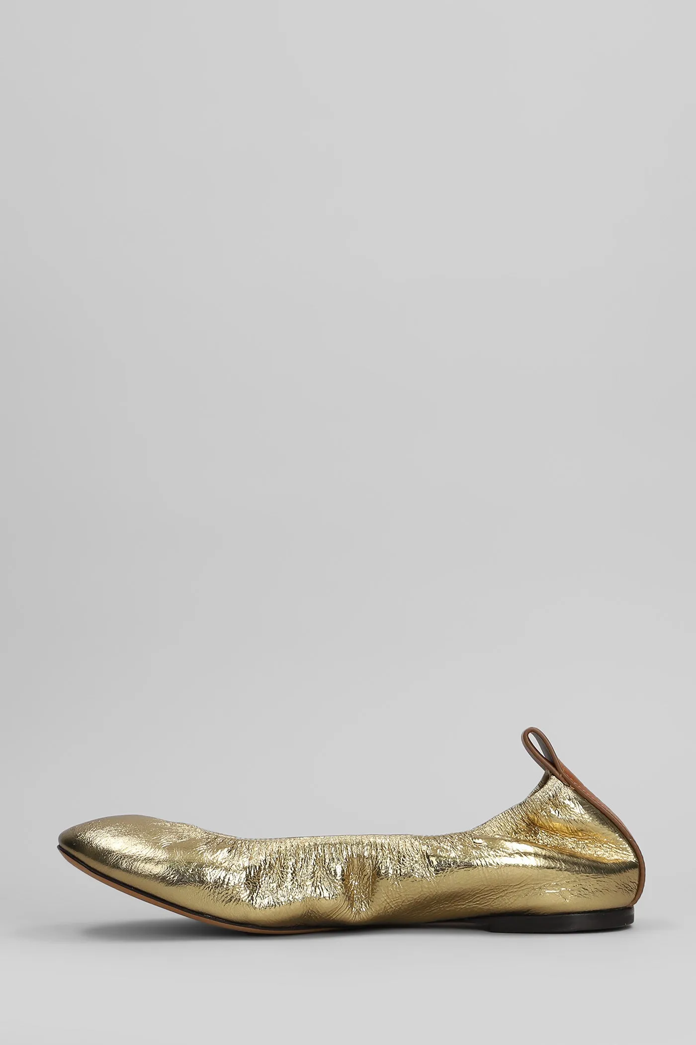 Ballet flats in gold leather