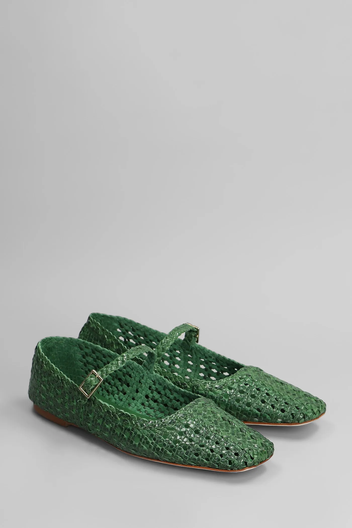 Ballet flats in green leather