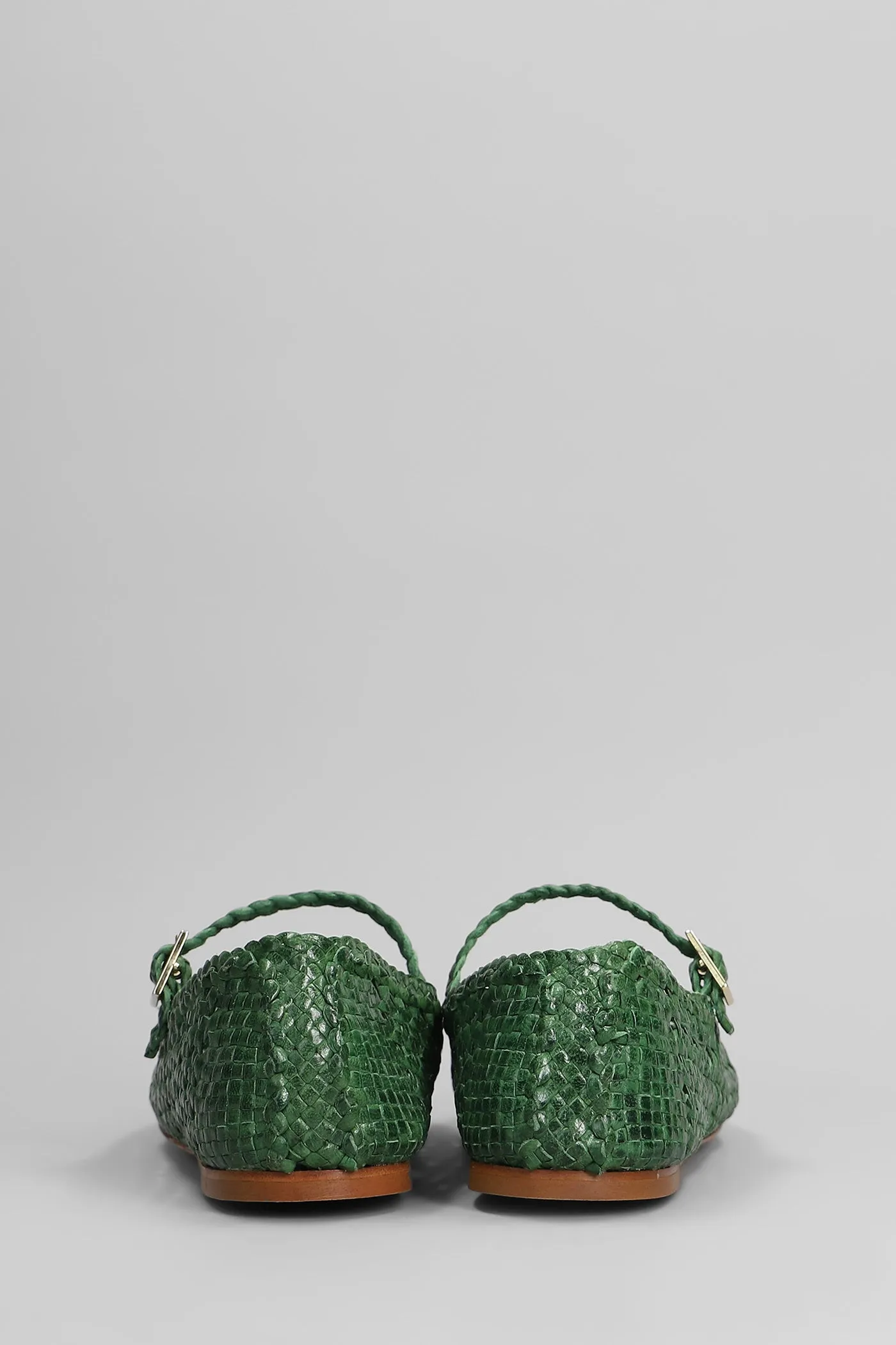 Ballet flats in green leather