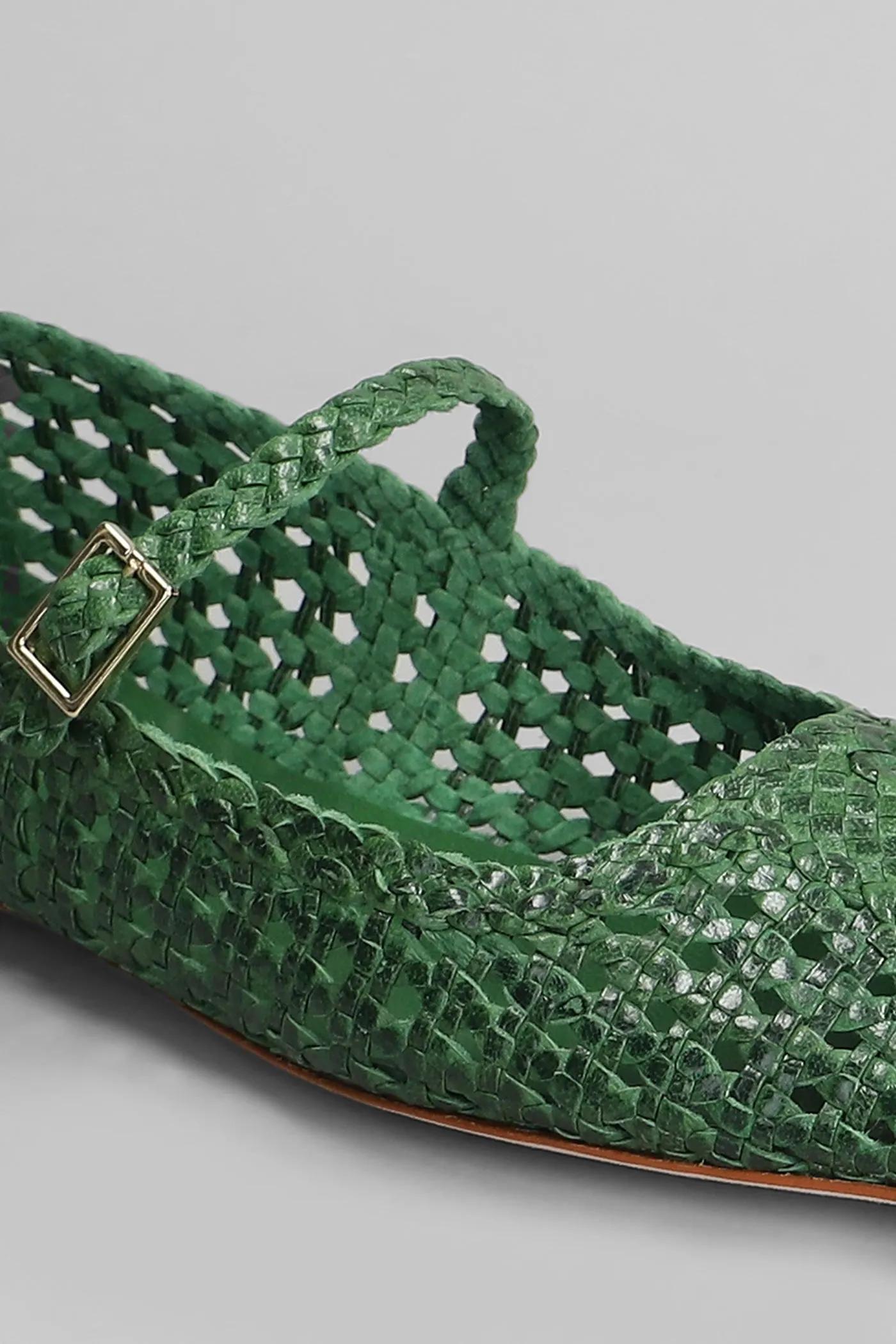 Ballet flats in green leather