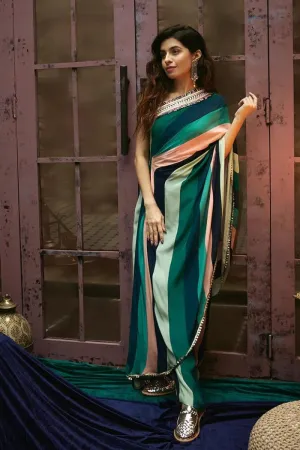 STRIPES PRINT ONE SHOULDER DRAPED SAREE TEAMED WITH PANTS